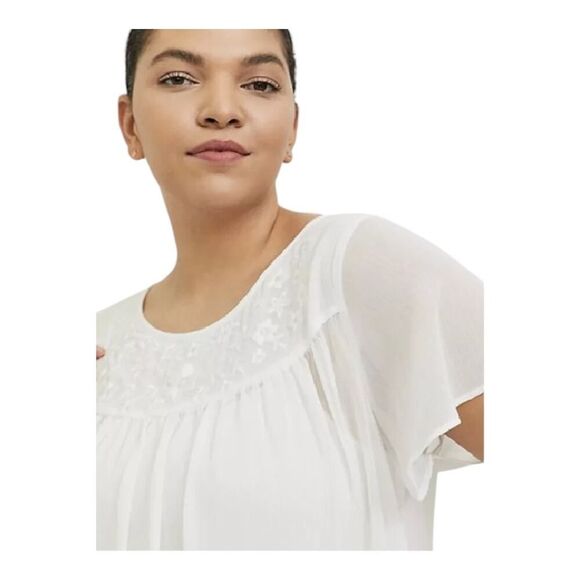 Torrid Large White Sheer to Semi-Sheer Short Sleeved Blouse Embroidered flowers - Picture 7 of 15